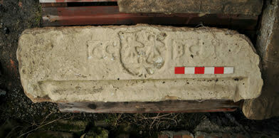 Marriage stone with carved initials